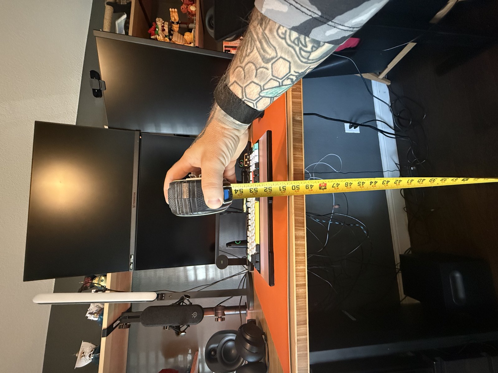 The top of the range by my own tape, right around 48 inches to the desktop