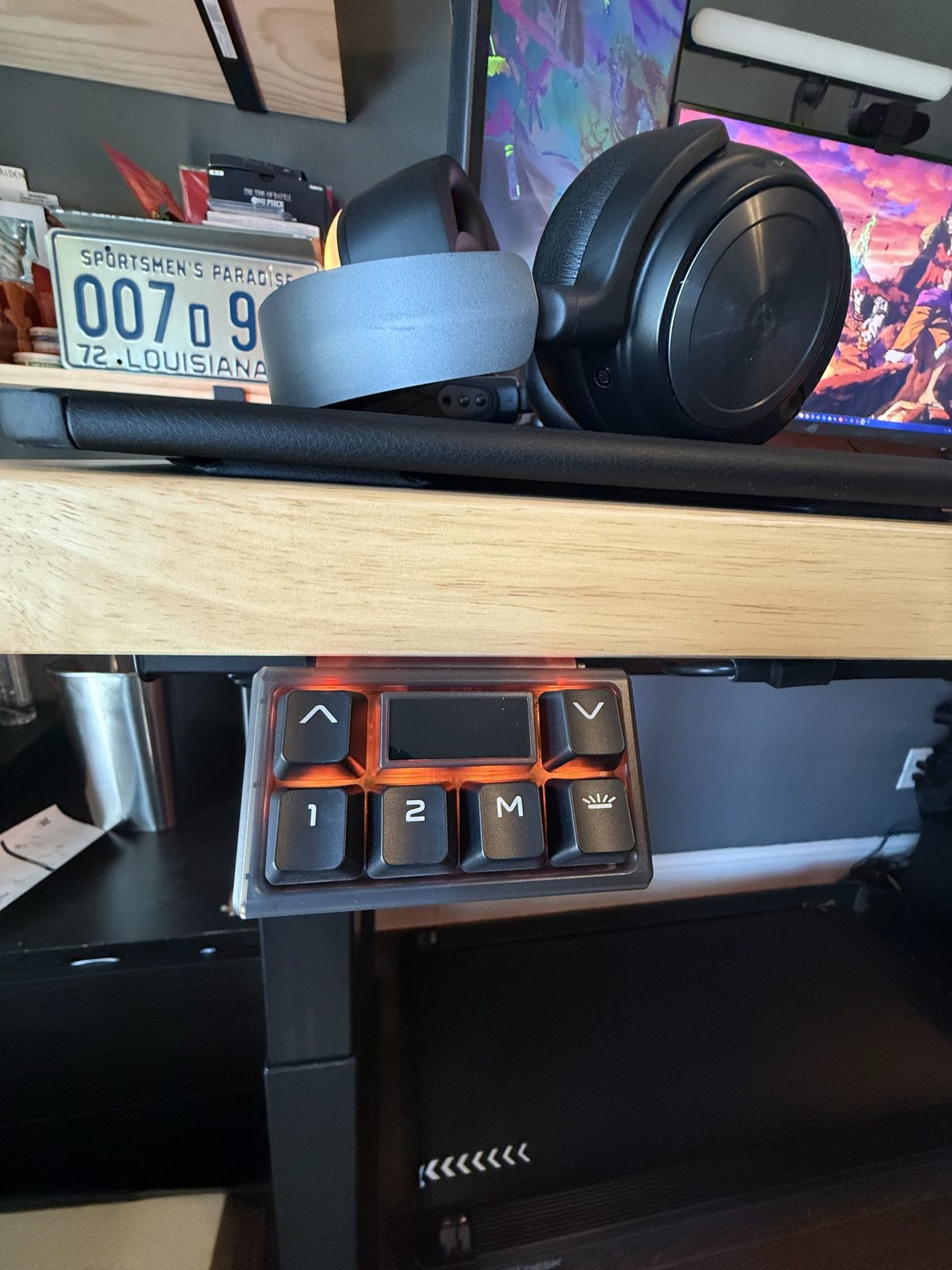 The UPLIFT memory keypad mounted on the desk edge