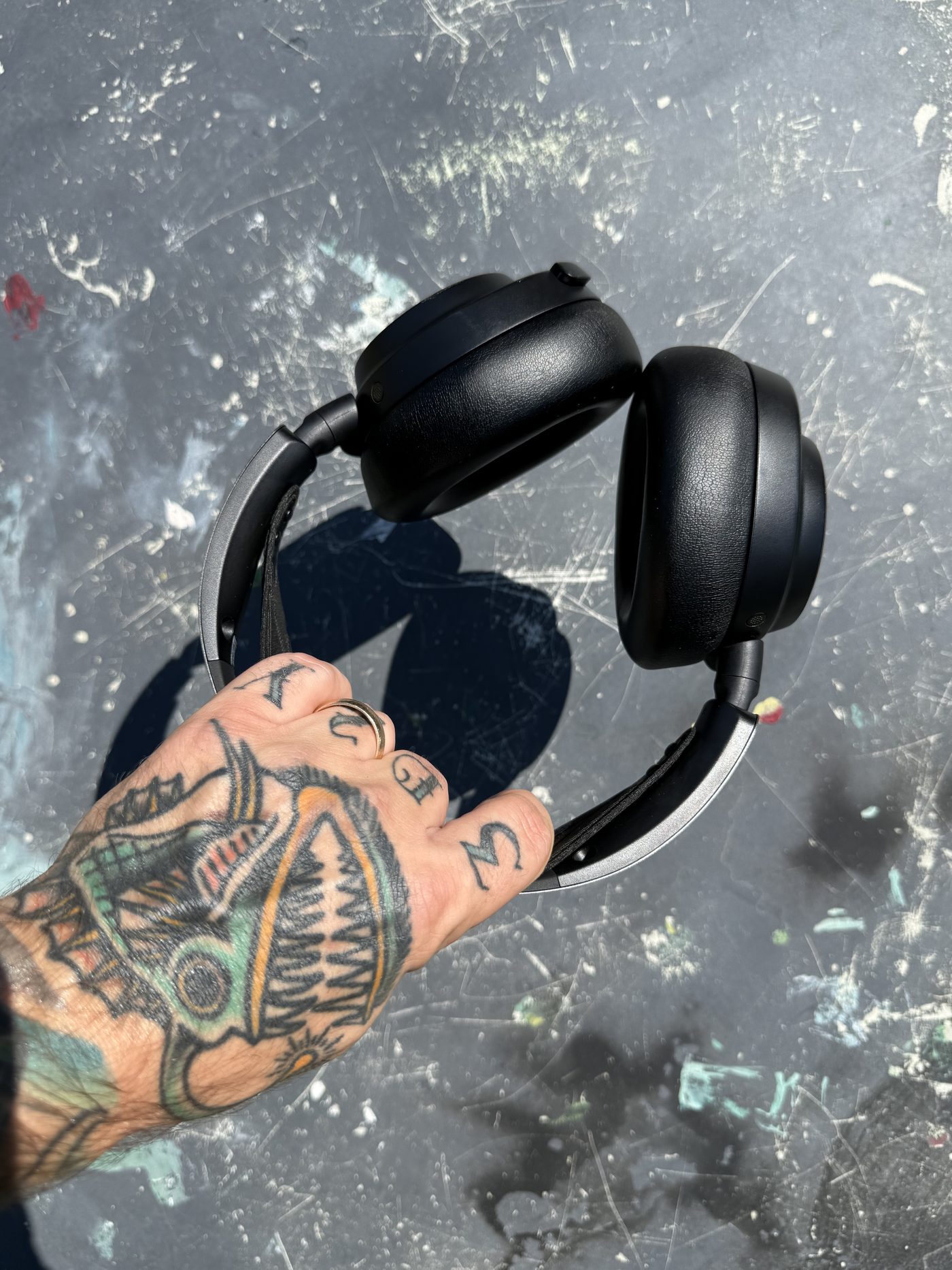 The Nova Pro Omni: leather pads, steel band, built like it expects a decade